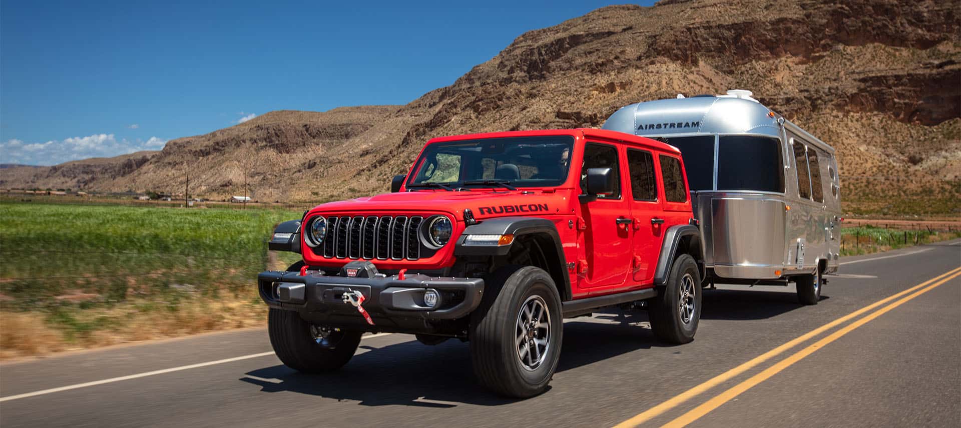 Jeep towing Airstream trailer