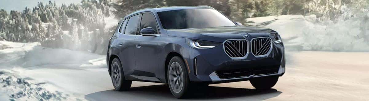 2026 BMW X3 Driving on a Snowy Day