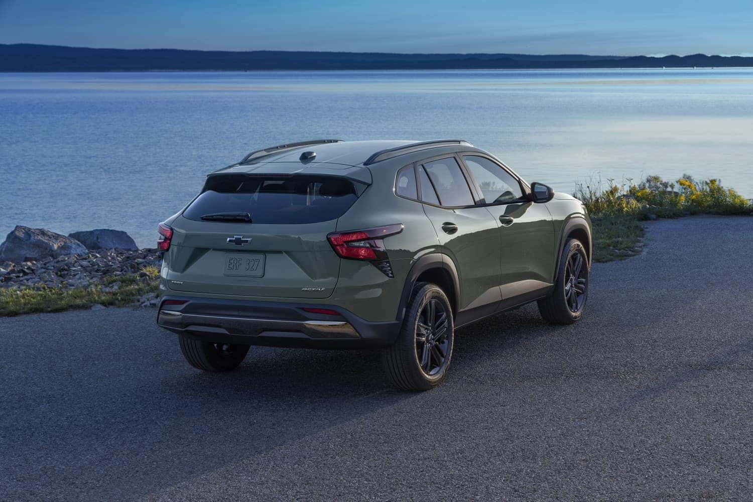 Chevy SUV parked by a lake