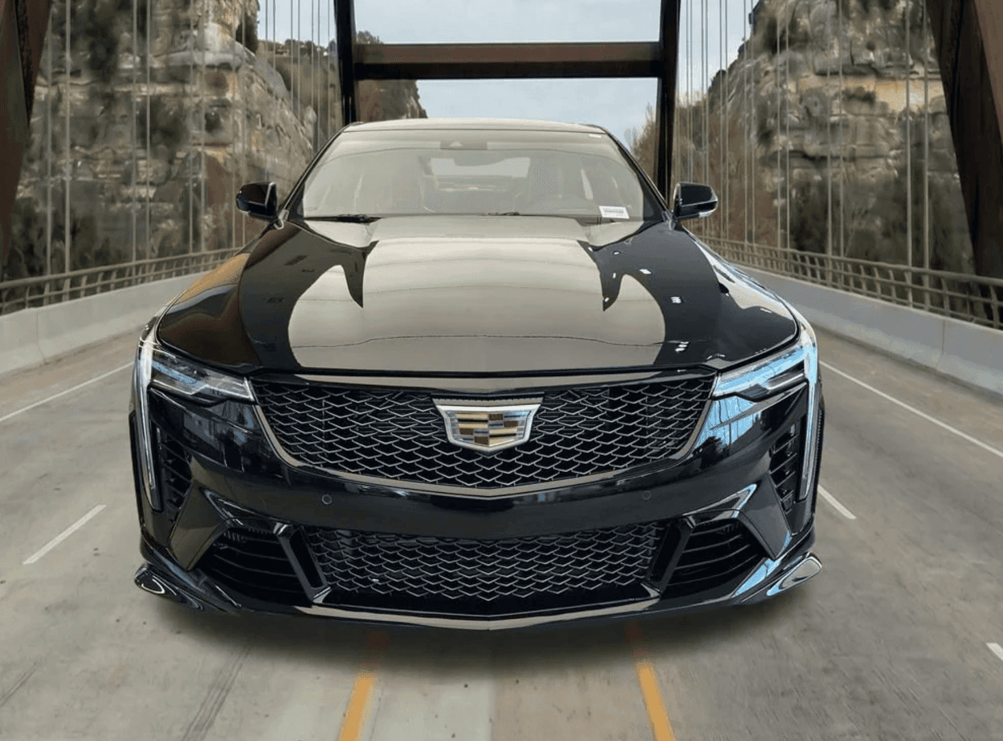 2026 Cadillac CT4 V-Series Blackwing parked in front of Covert Cadillac Bee Cave showroom in Austin, Texas
