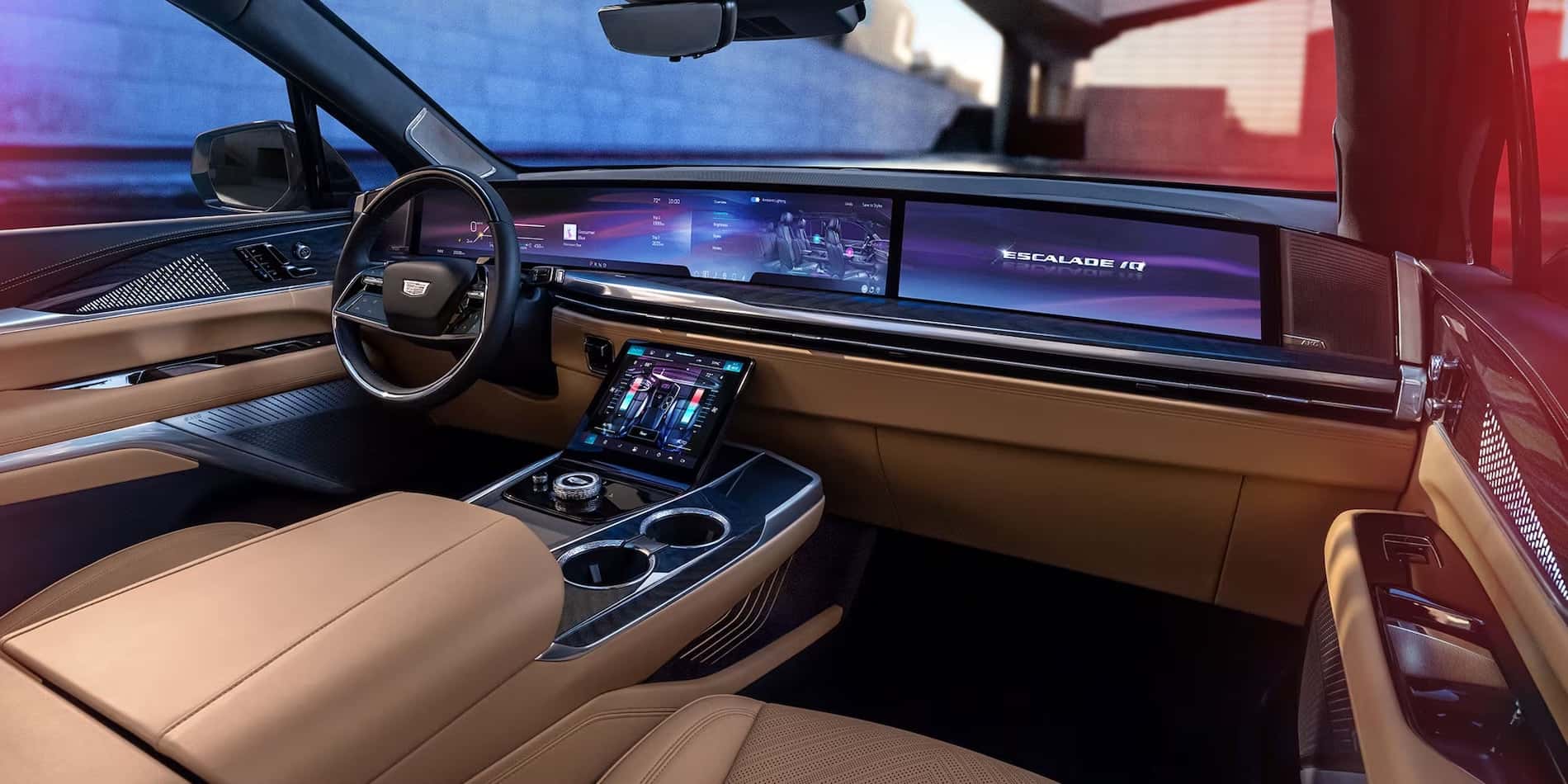 2026 Cadillac Escalade IQ Luxurious Tan Leather Interior Dashboard and Massive OLED Screens for sale at Covert Cadillac, Austin, Texas
