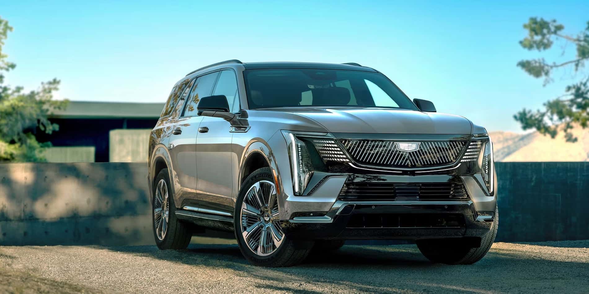 2026 Cadillac Escalade IQL Bold Front Three-Quarter View in Desert Landscape for sale at Covert Cadillac, Austin, Texas