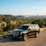 black Cadillac Escalade in austin texas for dealership service
