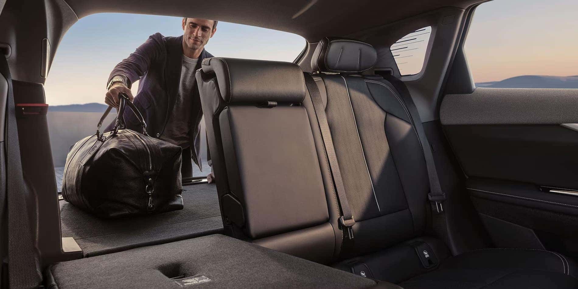 2027 Cadillac OPTIQ cargo area with rear seats folded