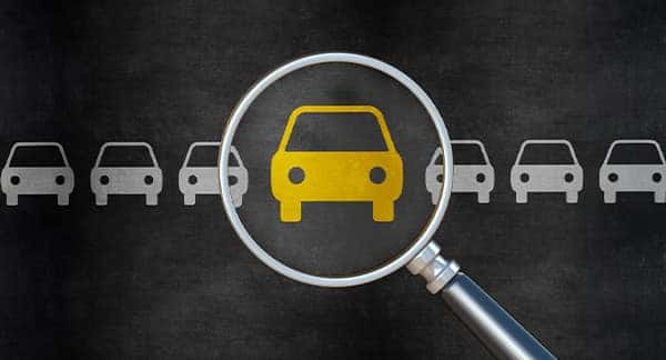 Vehicle line up with a magnifying glass