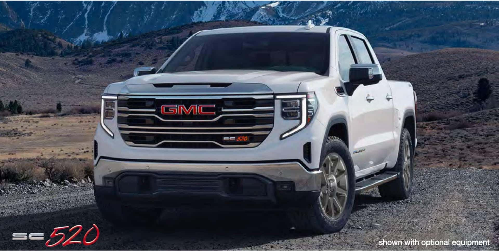 Sierra SC520 parked in front of mountain