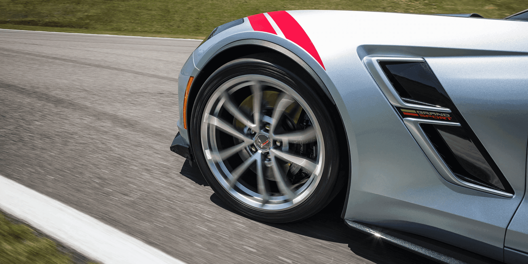 view of front left wheel and air vent of Corvette Z06
