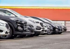 A bunch of used cars parked on our lot at our used car dealer near Revere MA.
