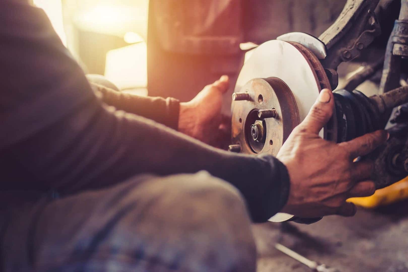 Toyota Technician working on the Brakes