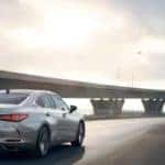Silver 2020 Lexus ES 350 driving on highway