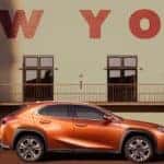 lexus ux in front of of new york sign