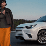 Woman Standing in front of Lexus TX