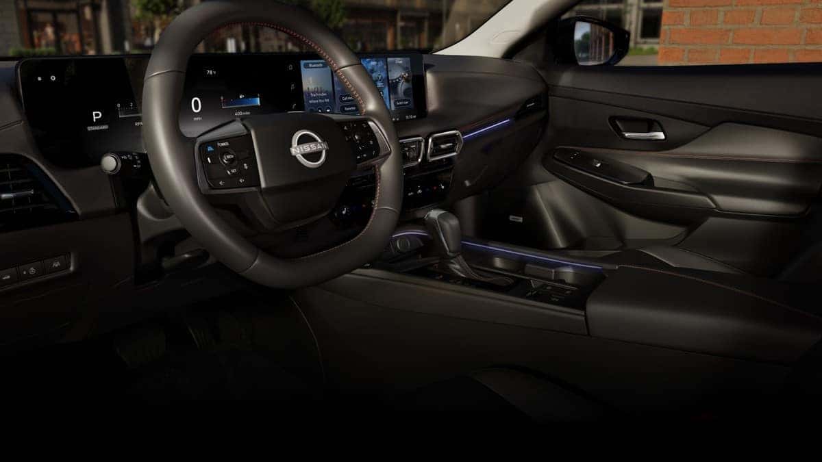 2026 Nissan Sentra cockpit with dual 12.3-inch displays and the steering wheel