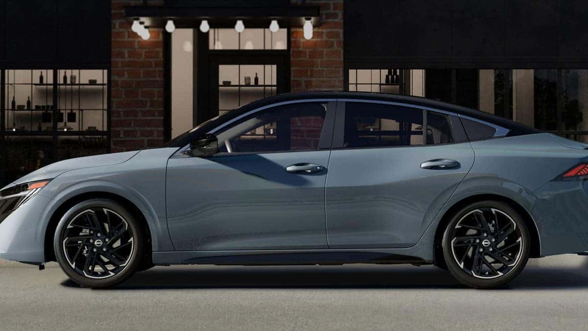 2026 Nissan Sentra, side profile parked in front of a city building