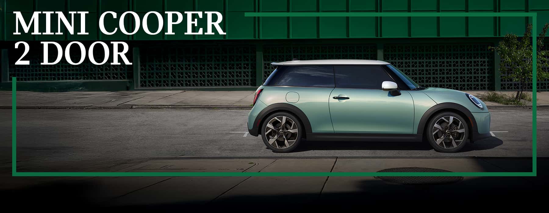 2026 MINI Cooper 2 Door showcasing its sporty design and iconic compact style, parked in front of a modern city backdrop at Patrick MINI.