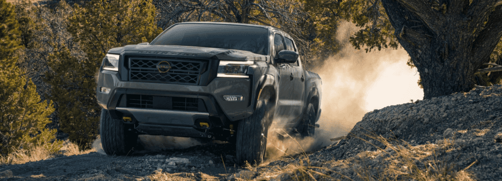 2023-Nissan-Frontier-climbs-dirt-mountain-trail