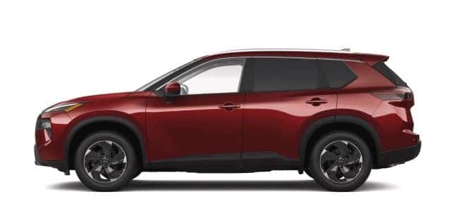 Red Nissan Rogue SUV shown in a side profile view, highlighting versatile design and everyday practicality in St. George, UT