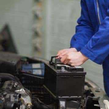 Mechanic charging car battery (1)