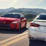 2020 Toyota Camry's driving on coast line