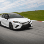 318468-a-front-3-4-shot-of-a-2022-toyota-camry-trd-driving-on-a-race-track-528x352
