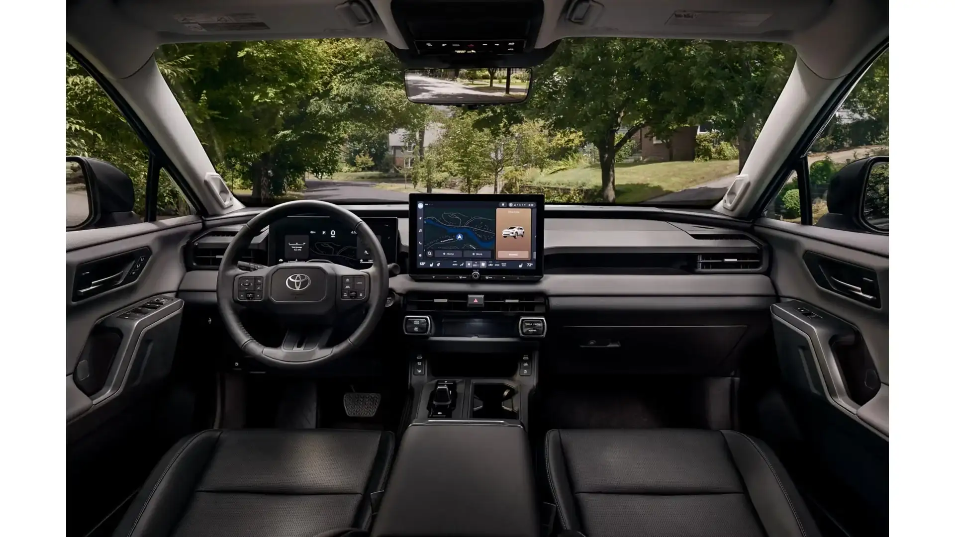 2026 Toyota RAV4 interior with the touchscreen and digital gauge cluster