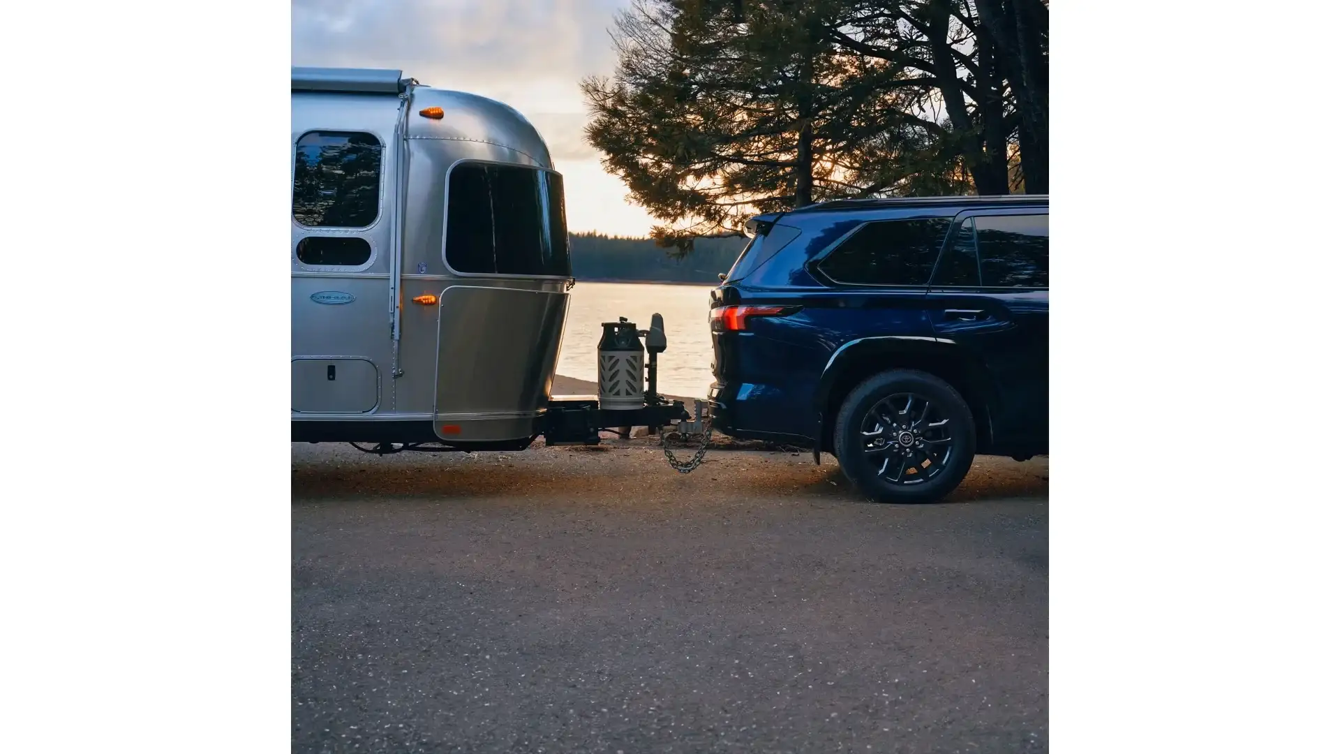 2026 Toyota Sequoia Platinum towing a travel trailer at dusk
