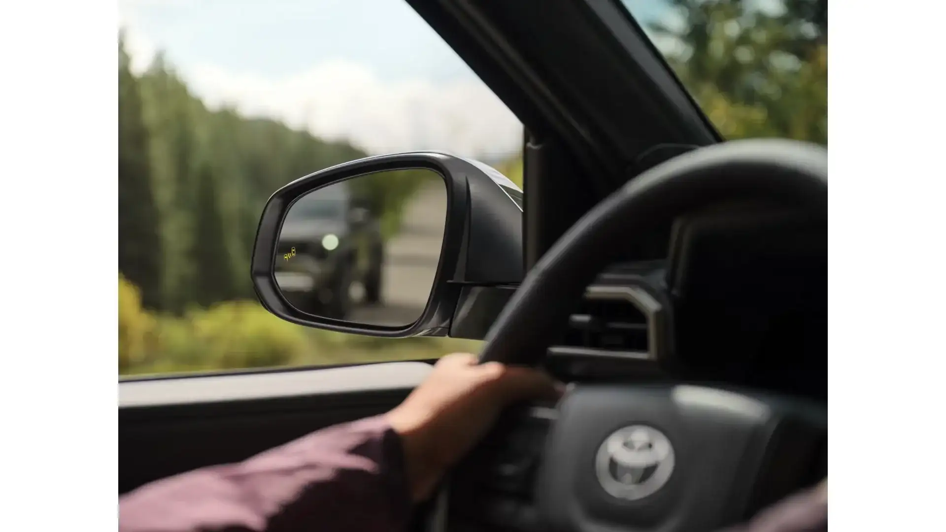 2026 Toyota Tacoma available blind spot monitor display