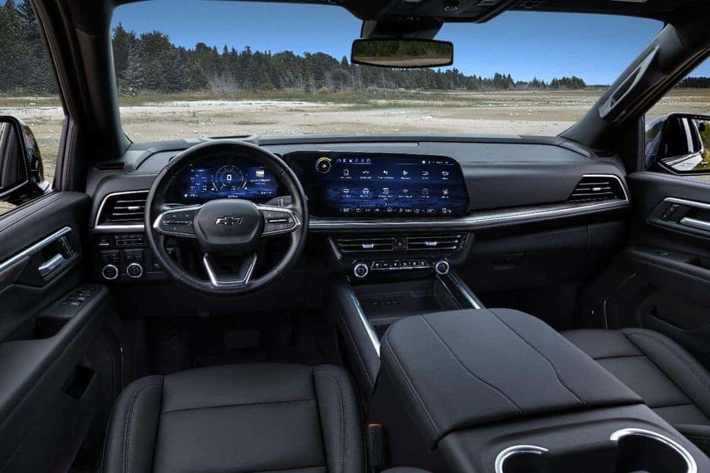 Interior of 2025 Chevy Tahoe in the desert with windshield