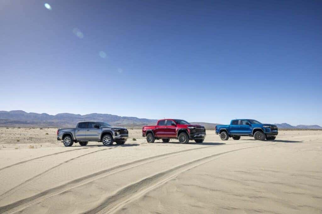 Three Chevrolet Colorados Parked in a Desert