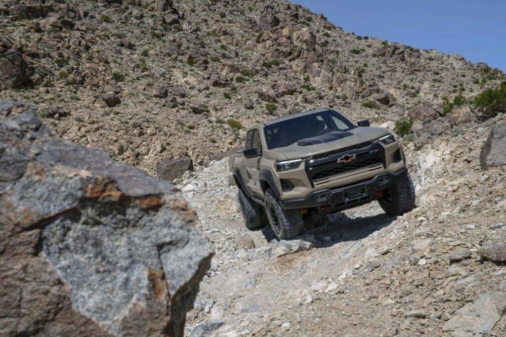 Front three-quarter view of the 2024 Colorado ZR2 Bison on an off-road trail