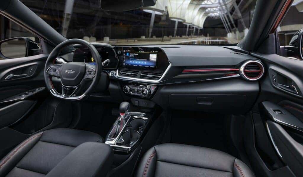View of front cabin in Chevrolet Trax RS with Jet Black with Red Accents Interior. Pre-production model shown. Actual production model may vary. Available in spring 2023.