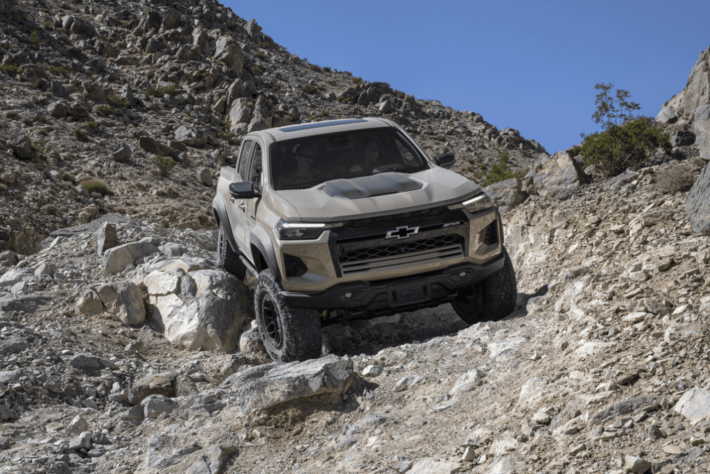 Chevy Colorado ZR2 Bison Off-Roading Down a Rocky Incline Front 3/4 View
