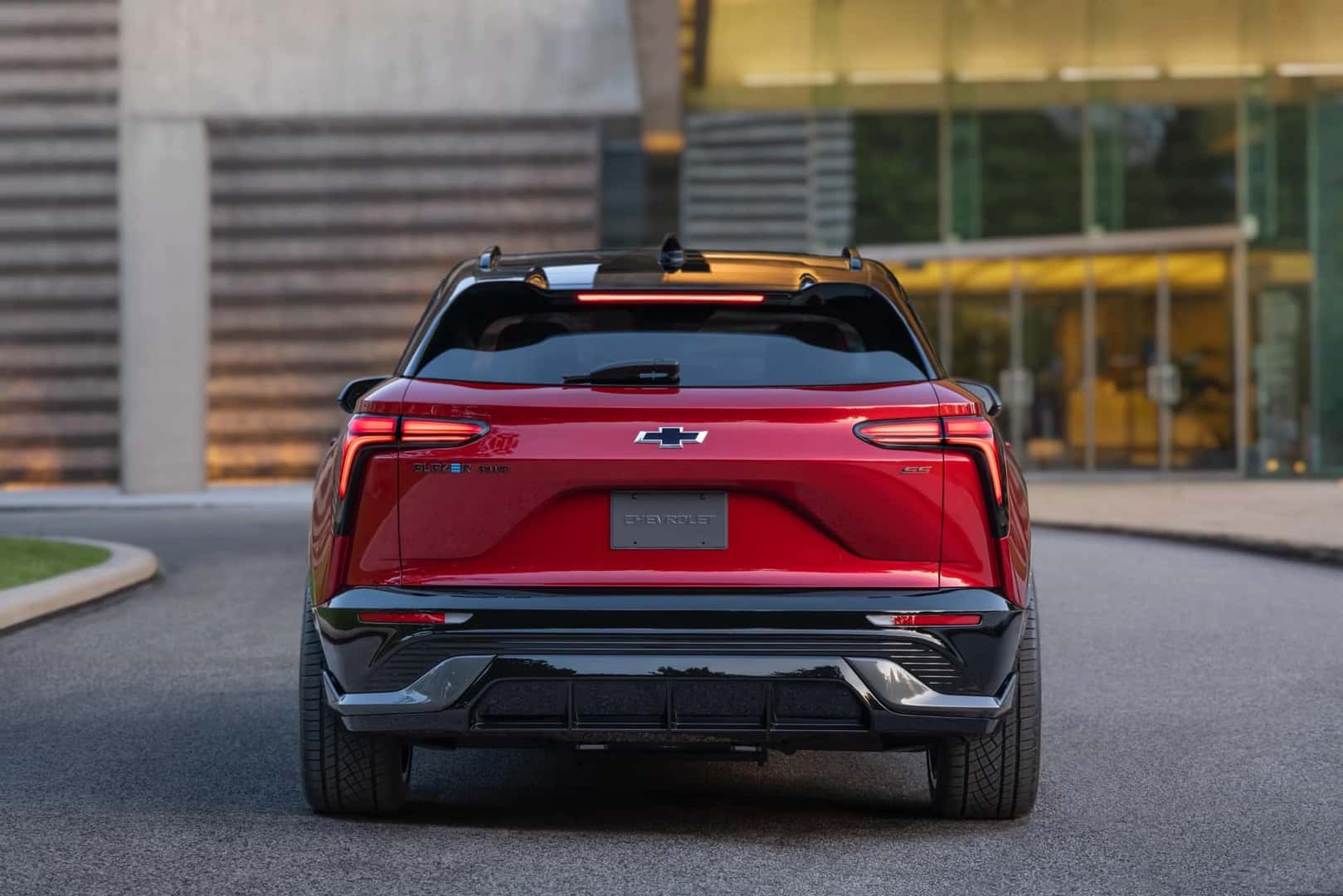 Rear trunk view of the 2025 Chevy Blazer EV in red. 