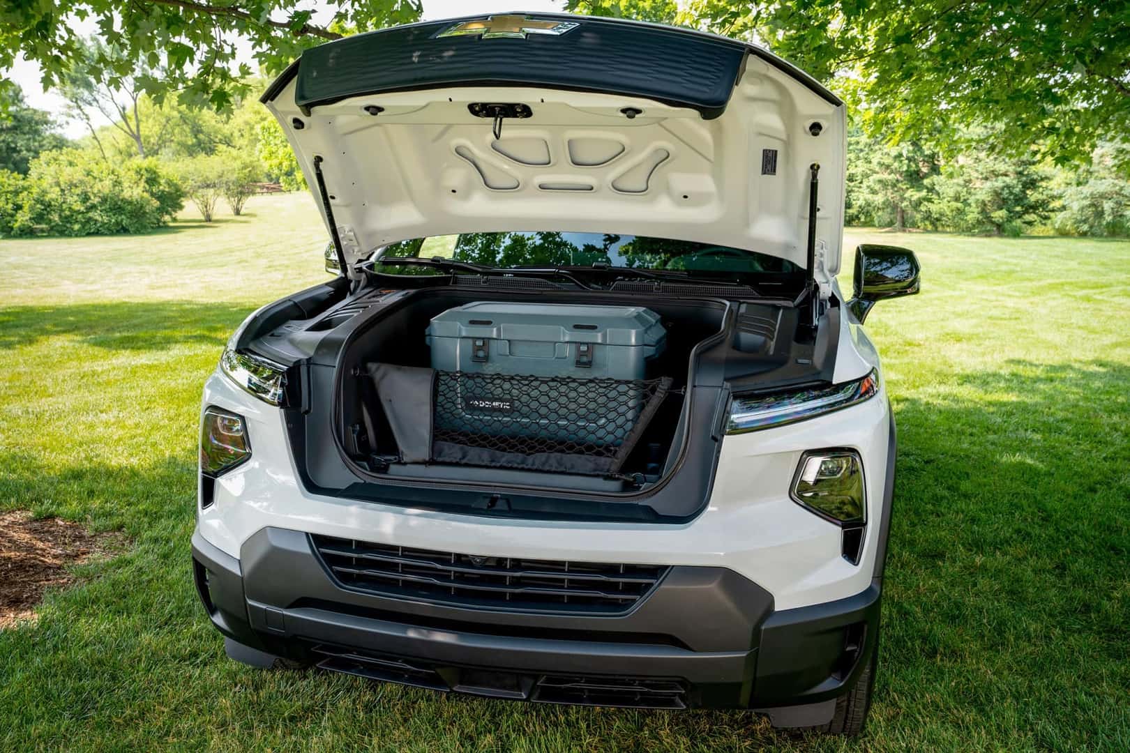 Summit White 2024 Chevrolet Silverado EV RST with eTrunk open