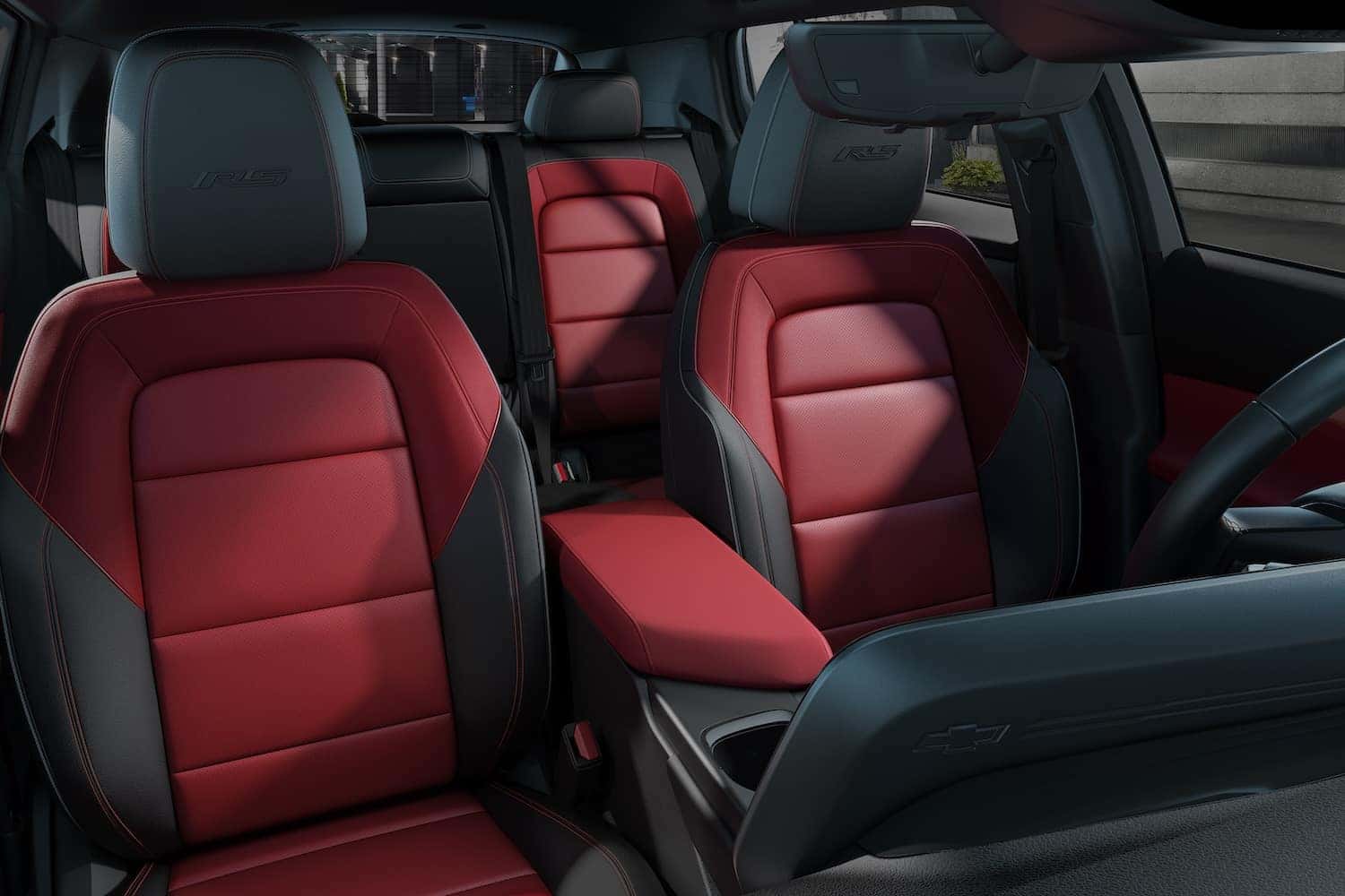 View of front and rear cabins in 2024 Chevrolet Equinox EV 3RS with Adrenaline Red interior. Preproduction model shown. Actual production model may vary. Visit chevy.com/EquinoxEV for availability.