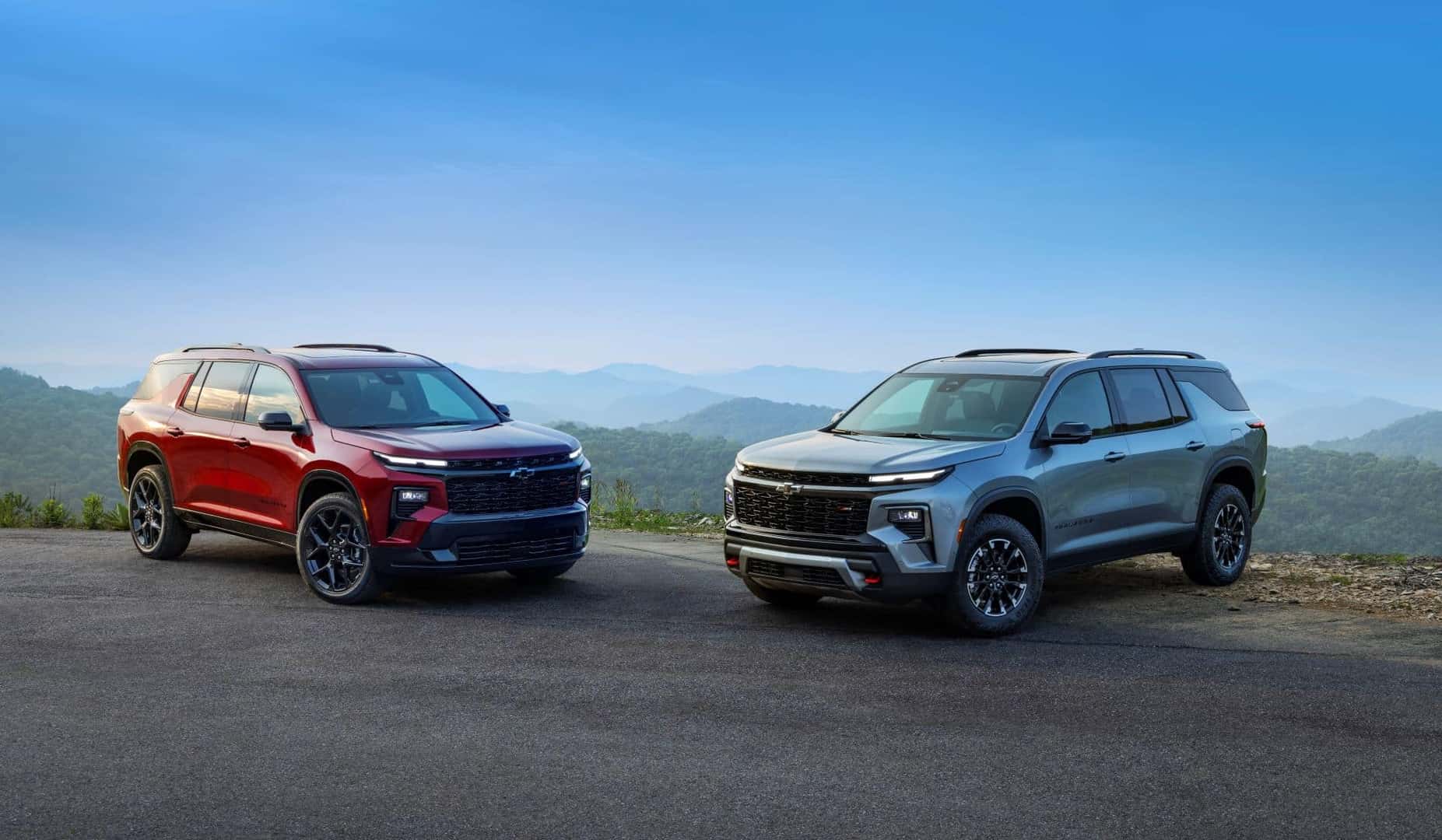 Gorgeous Lineup Of 2024 Chevrolet Traverses, On The Edge Of Cliff Overlooking A Grand Valley