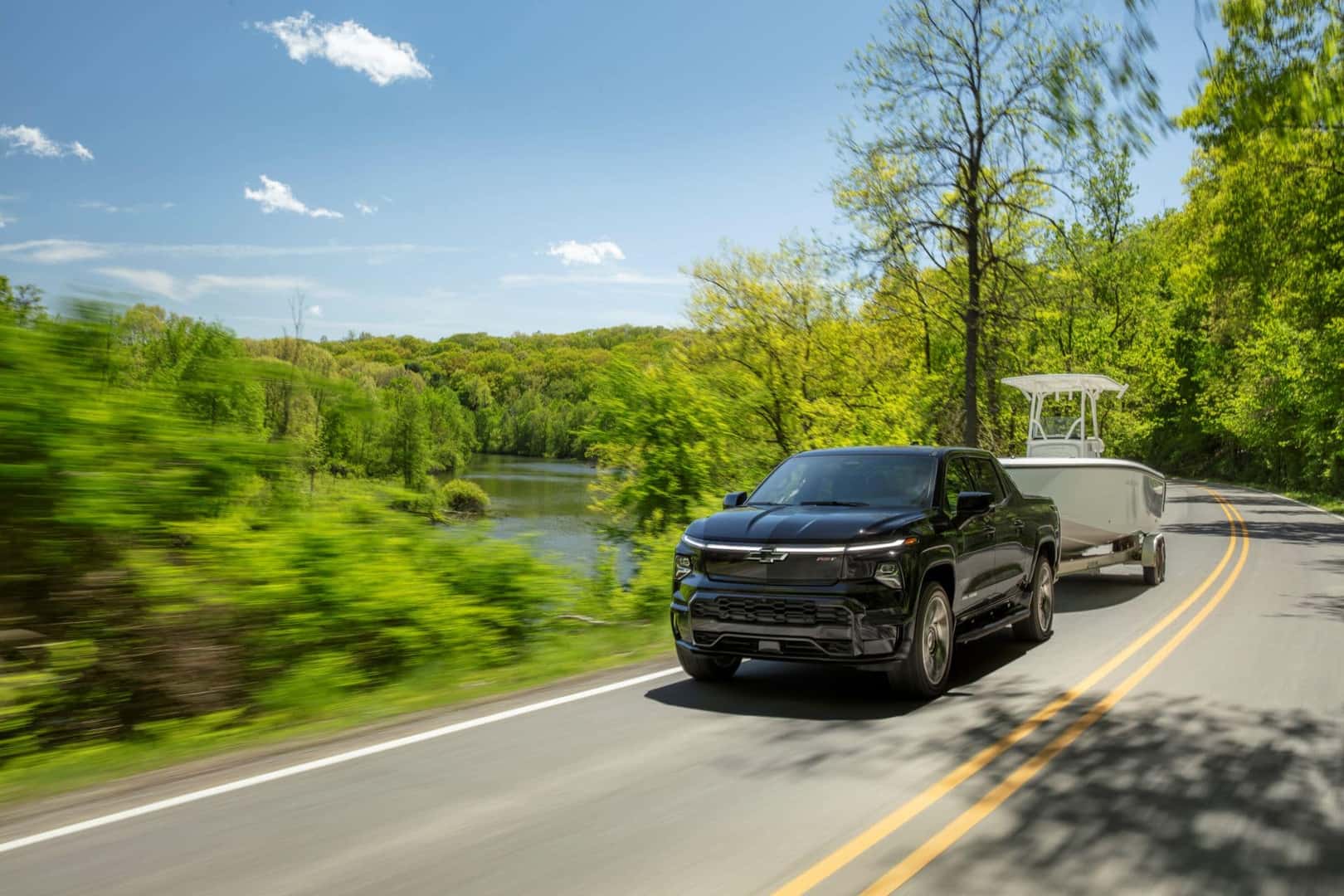 The Epic 2024 Silverado EV Rushing Past Beautiful Greenery