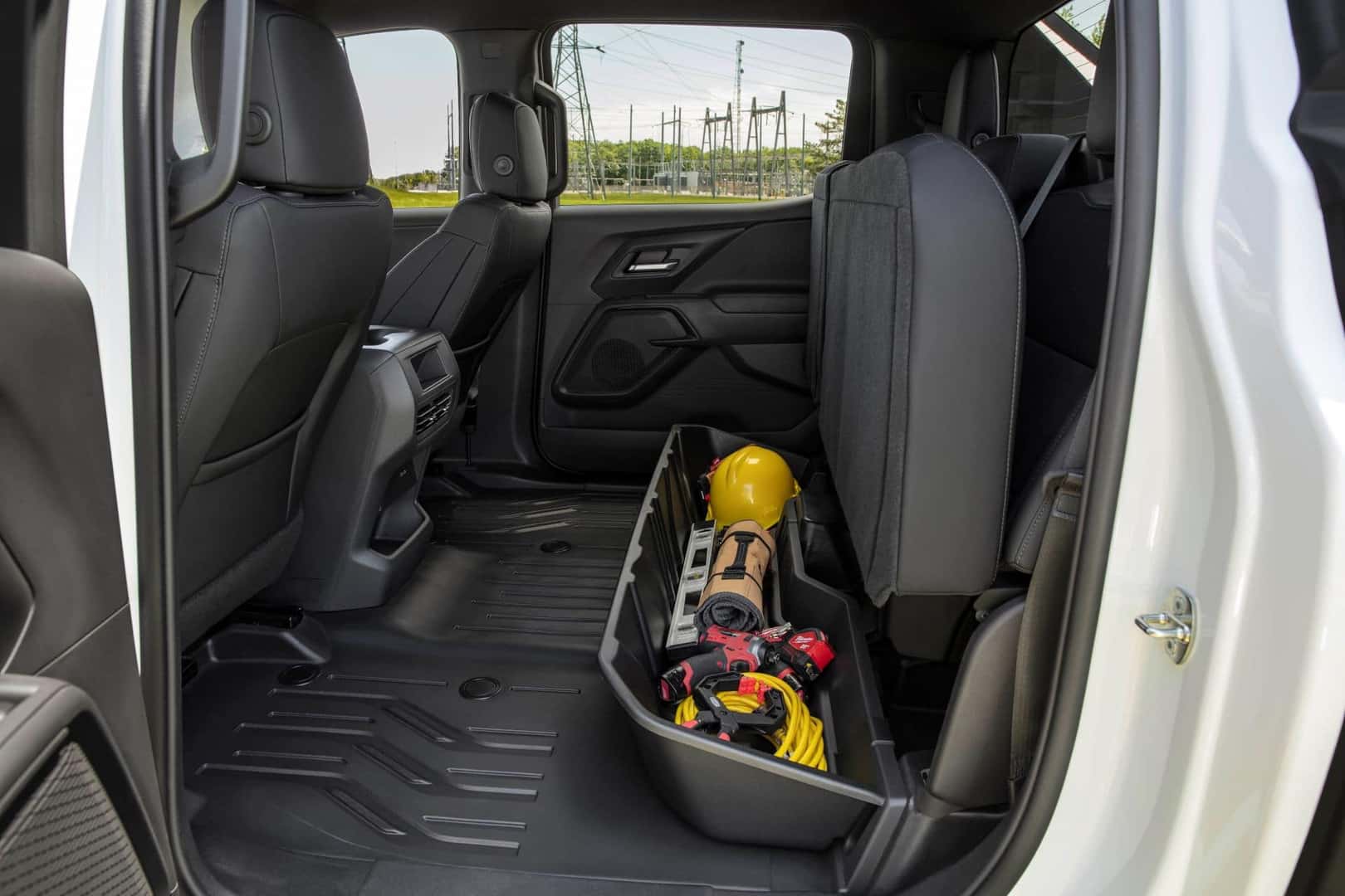The Hidden Compartment Under The Rear Seats Of Spacious 2024 Silverado EV