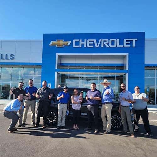 Daisy, from Bellevue, Idaho, with her Mosaic Black Metallic 2023 Chevy Trailblazer AWD LT with Purchase Advisor Gustavo 'Goose' Ceron in front of Twin Falls Chevrolet - the Magic Valley's #1 Chevy Dealer, located in Twin Falls, Idaho.