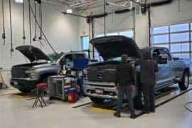 2 trucks in for express service, enjoying $59.95 Oil Changes available at Twin Falls Chevrolet