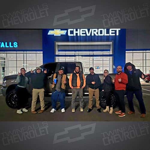 Nelson & Moises, from Jerome, Idaho, with Purchase Advisor Gustavo 'Goose' Ceron and their Austin Tan Pearl 2010 Dodge Ram 2500 Laramie.