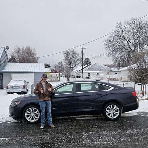 Product Specialist Jacob Breault delivered Troy's Blue Velvet Metallic 2016 Chevy Impala 1LT to his home in Gooding, Idaho