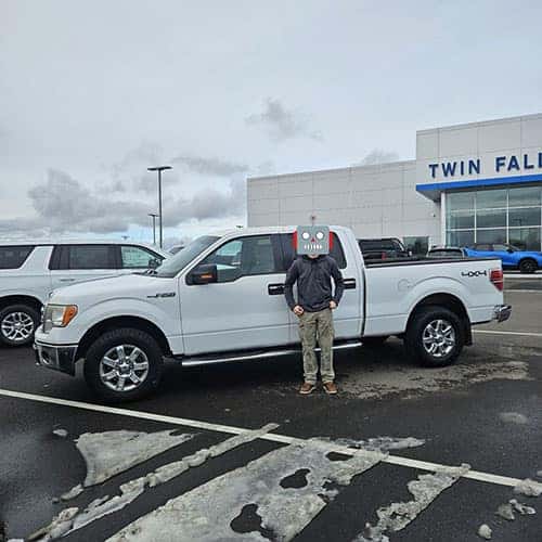 Mr. J, from Hazelton, Idaho, with his Oxford White 2014 Ford F-150 XLT- assisted by Product Specialist Jacob Breault at Twin Falls Chevy on Poleline Rd in Twin Falls, Idaho