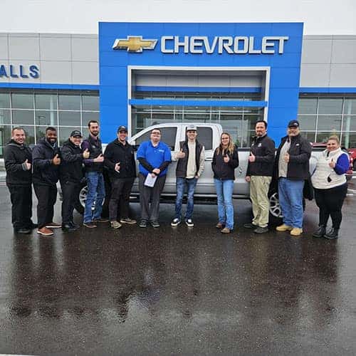 Ron, from Wendell, Idaho, with Product Specialist Jacob Breault & his Mineral Metallic 2017 GMC Sierra 1500 SLE at Twin Falls Chevy.
