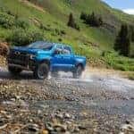 The Fabulous 2024 Chevy Silverado ZR2 Off-Roading With Grace In A Beautiful Landscape