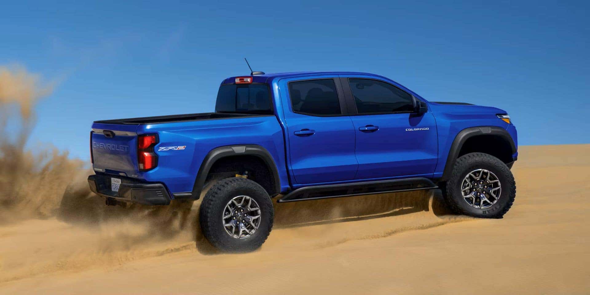 The 2025 Chevy Colorado Racing Over the Sand Dunes, Puffing Sand Behind Itself