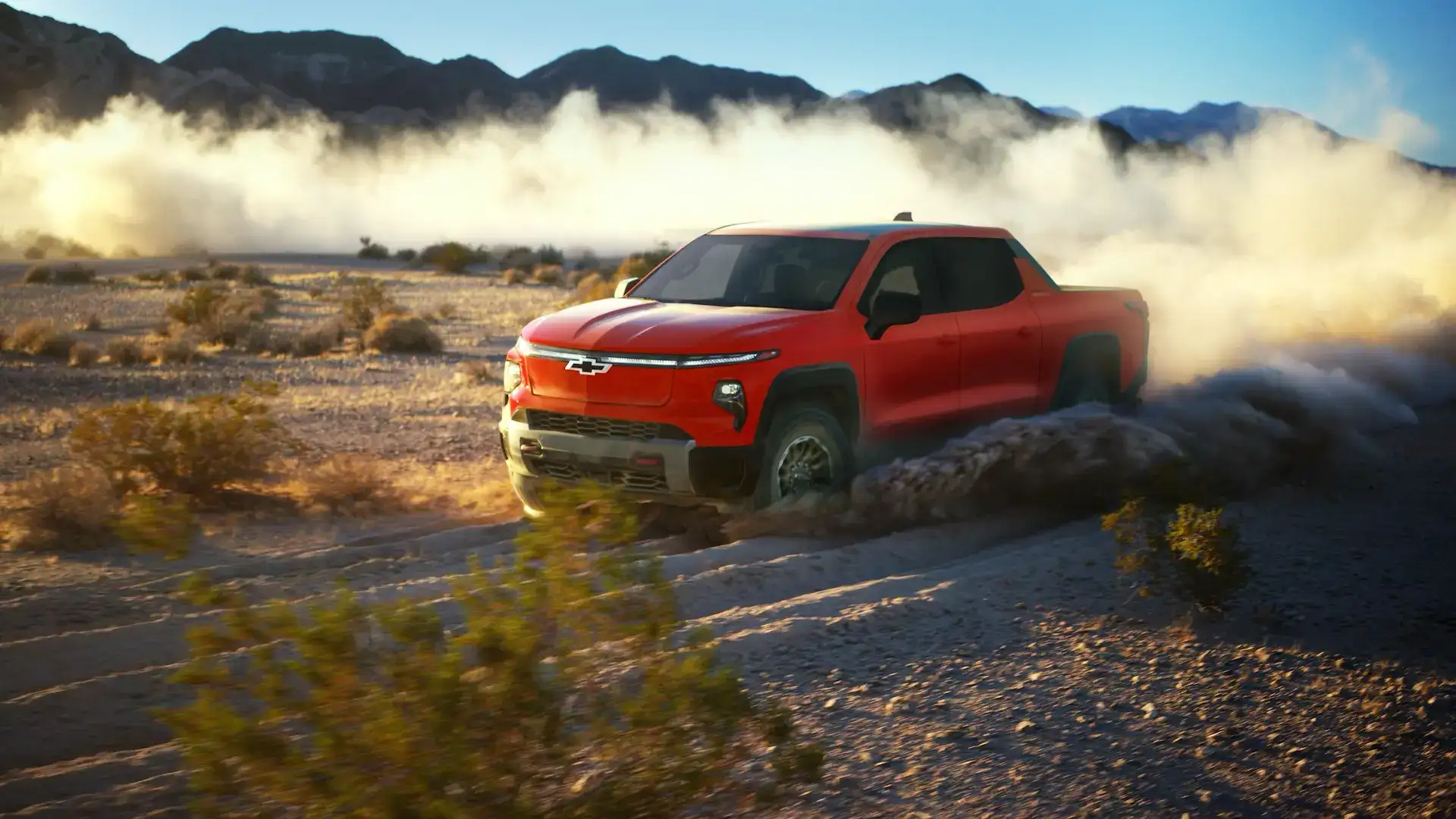 2026 Chevrolet Silverado EV Trail Boss off roading in the mountains 