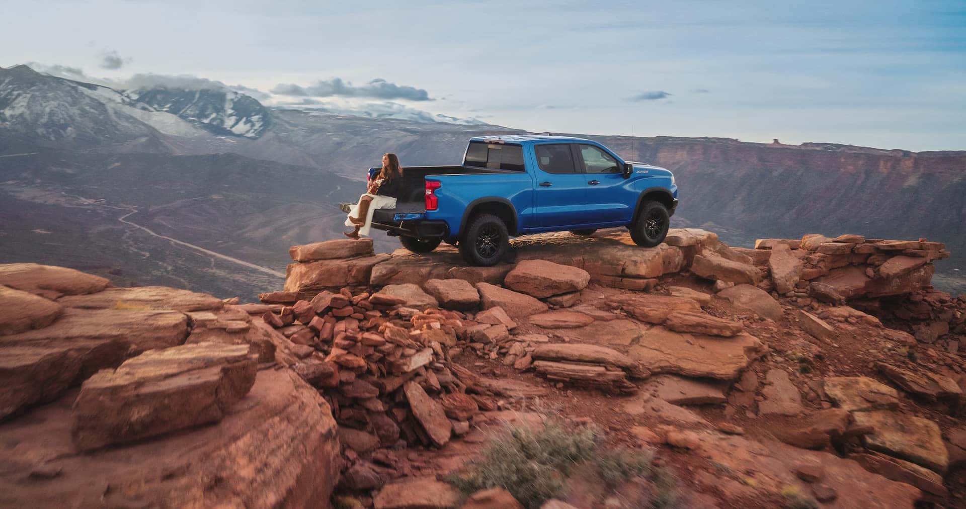 Rising County Music Artist Brooke Lee Sitting n the Tailgate of the Chevrolet Silverado ZR2 on top of Castleton Tower in Utah