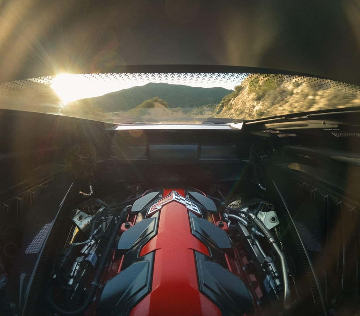 Sunrays Shines Down On The The High-Performance V8 Engine Through The 2027 Chevy Corvette's Open Hood