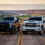 Two 2026 Chevrolet Silverado 1500s parked side by side on a Magic Valley farm road near Twin Falls, Idaho